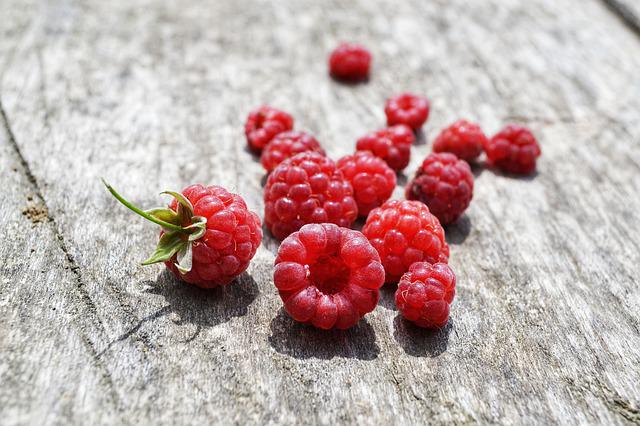 raspberries on wood